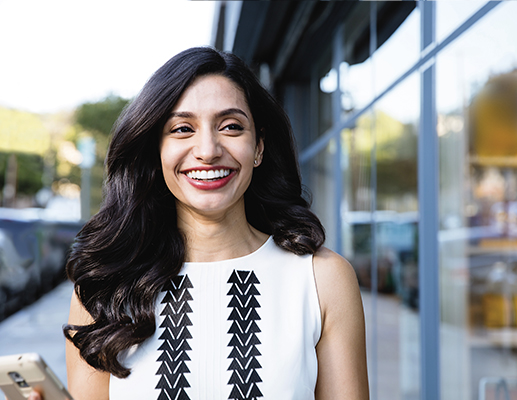 A traveller wearing Invisalign clear aligners